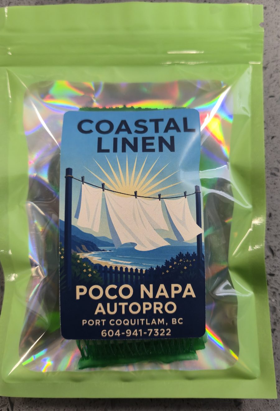 A sealed pack of five Coastal Linen vent air fresheners in a green pouch